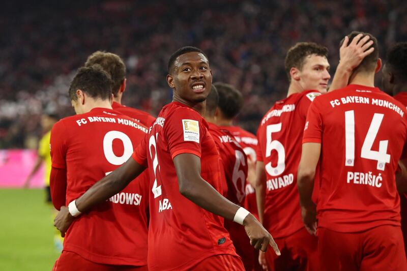 David Alaba celebrates a goal with Bayern Munich teammates. Getty Images