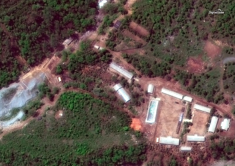 FILE - This Wednesday, May 23, 2018 satellite file image provided by DigitalGlobe, shows the Punggye-ri test site in North Korea. North Korea has carried out what it says is the demolition of its nuclear test site in the presence of foreign journalists. The demolition happened Thursday at the site deep in the mountains of the North's sparsely populated northeast. The planned closing was previously announced by leader Kim Jong Un ahead of his planned summit with U.S. President Donald Trump next month. (DigitalGlobe via AP, File)