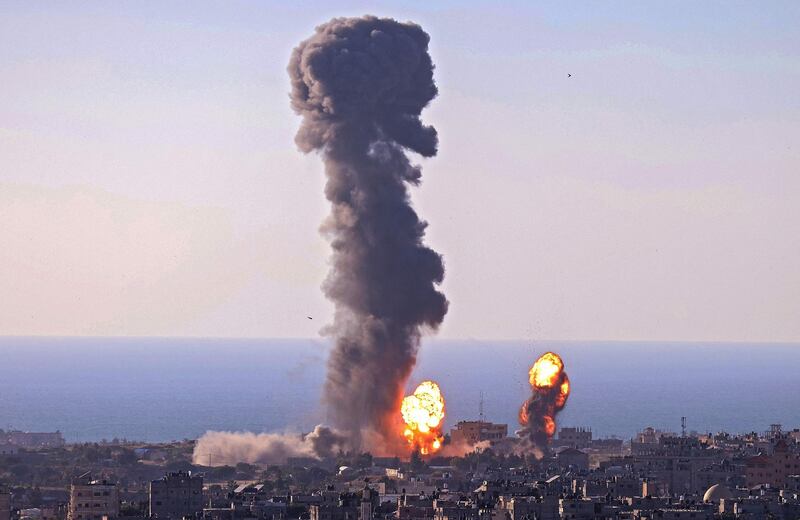 Smoke billows following an Israeli air strike on targets in Rafah in the southern Gaza Strip on May 13, 2021. AFP