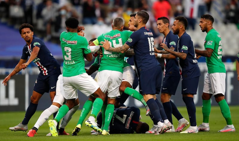 Players battle after the tackle on Kylian Mbappe. AP