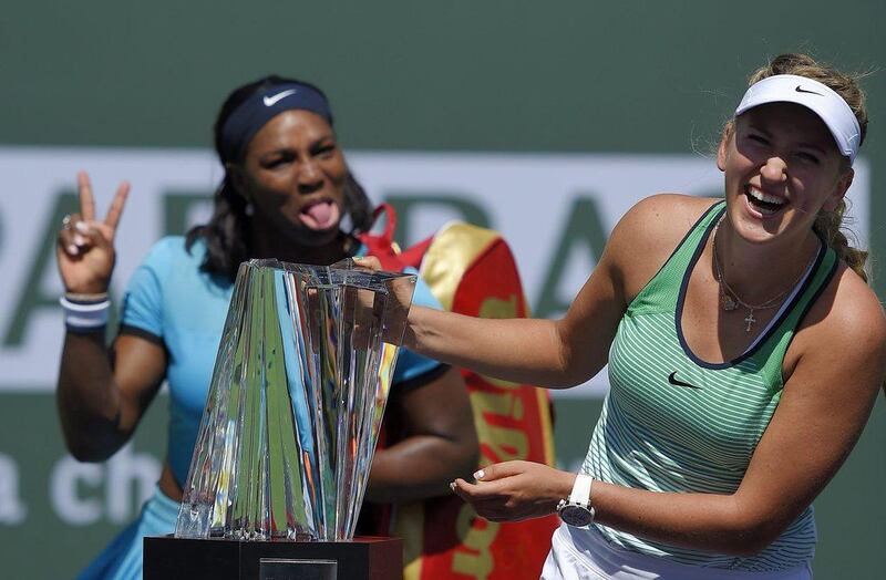 Serena Williams, left, jokes behind Victoria Azarenka, of Belarus, after Azarenka defeated her in a final at the BNP Paribas Open tennis tournament, Sunday, March 20, 2016, in Indian Wells, Calif. Azarenka won 6-4, 6-4. (AP Photo/Mark J. Terrill) 