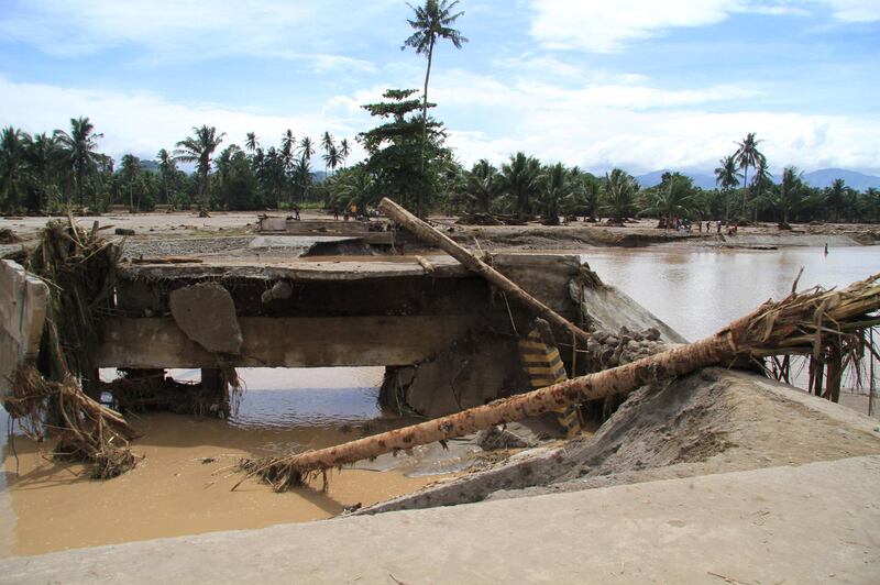 A general view of a destroyed bridge after flash floods in Salvador, Lanao del Norte, in southern Philippines on December 23, 2017. Richel V Umel / Reuters