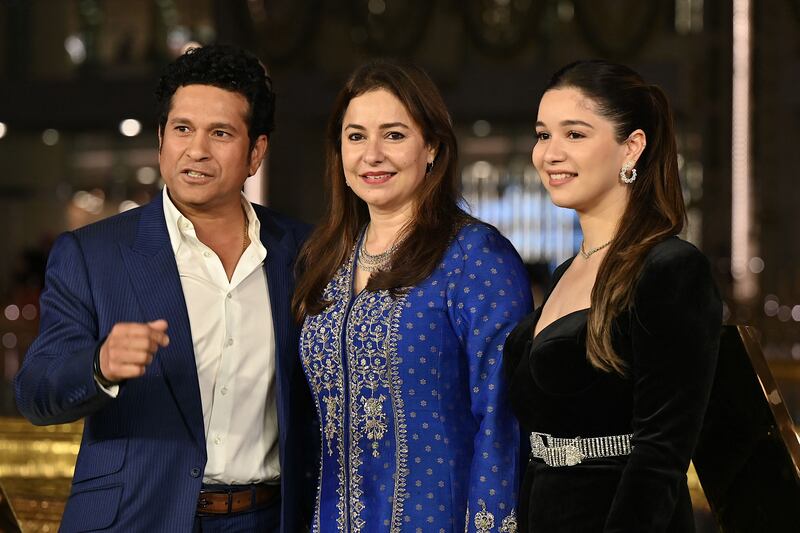 Former Indian former cricketer Sachin Tendulkar with his wife Anjali and daughter Sara. AFP