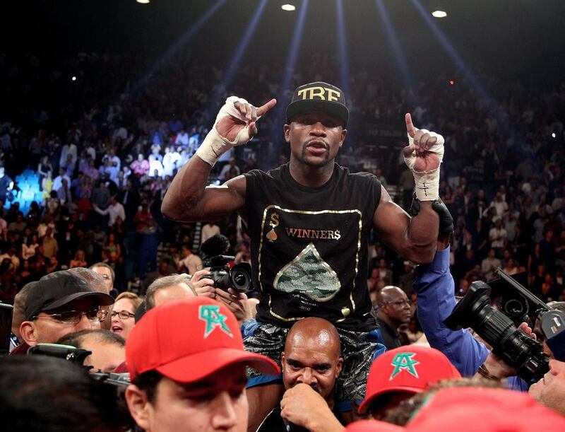 Floyd Mayweather has far more to lose than Manny Pacquiao when the two finally meet May 2. John Gurzinski / AFP



