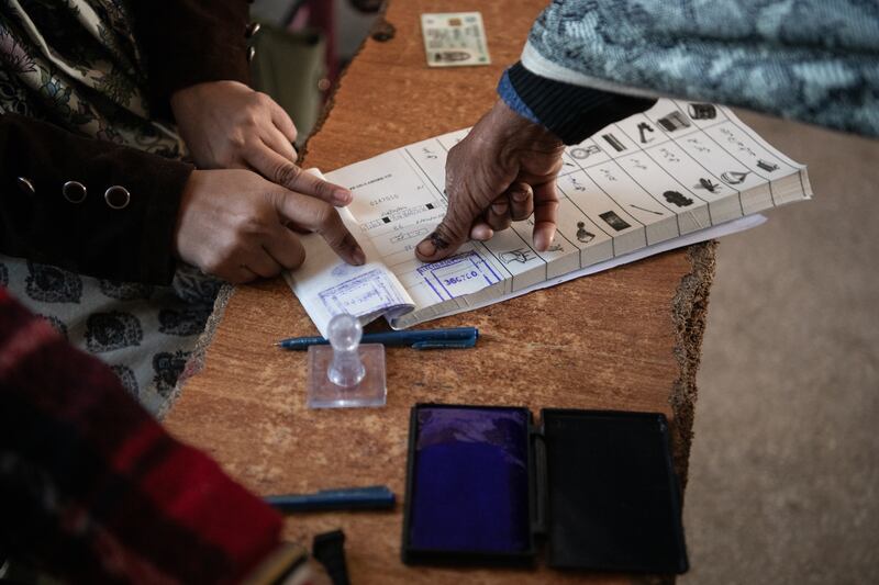 A Pakistani voter at a polling station in Wahgrian. Getty Images