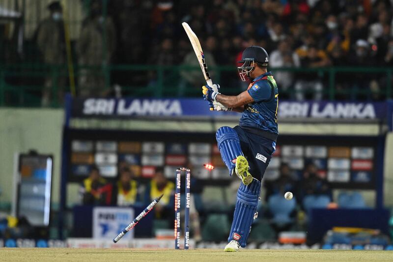 Sri Lanka's Danushka Gunathilaka is bowled by India's Mohammed Siraj during the third T20 in Dharamsala. AFP