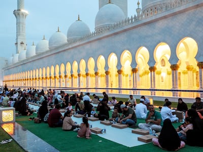 Iftar meals being distributed to visitors at the Sheikh Zayed Grand Mosque in Abu Dhabi. Victor Besa / The National.