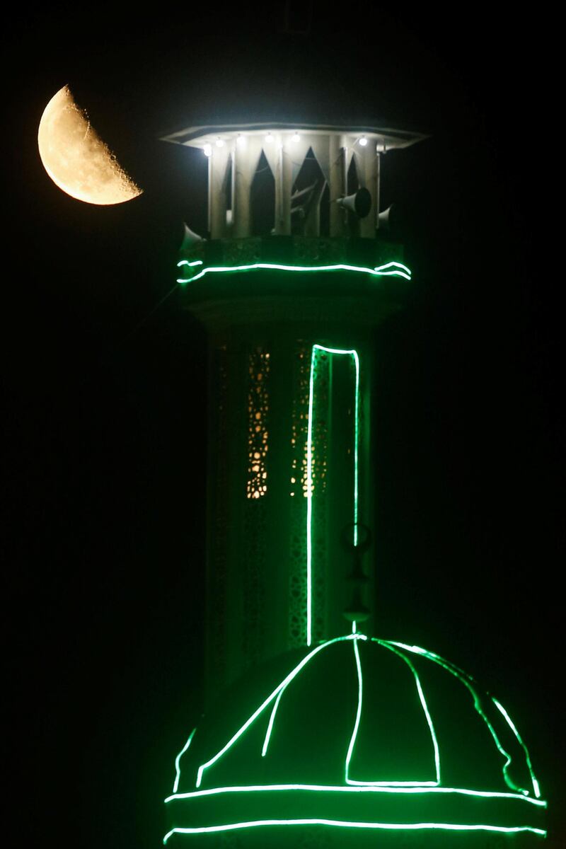 The moon and a mosque's decorated minaret shine bright during Ramadan in Cairo, Egypt. Reuters