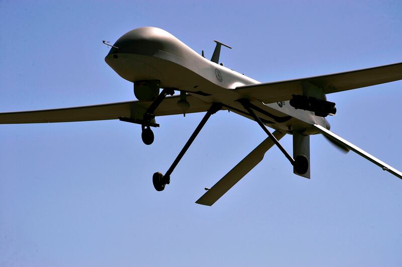 (FILES) In this US Air Force file photo taken on October 21, 2015 a MQ-1B Predator remotely piloted aircraft flies overhead during a training mission, in Nevada. The US Army said on October 22, 2020 it carried out a drone strike against Al-Qaeda leaders in northwest Syria near the border, killing 14 jihadists, according to a war monitor. The Syrian Observatory for Human Rights (OSDH) said the victims included five foreigners and six commanders. "US Forces conducted a strike against a group of al-Qaeda in (AQ-S) senior leaders meeting near Idlib, Syria," said Major Beth Riordan, the spokeswoman for United States Central Command (CENTCOM). / AFP / US AIR FORCE / - / = RESTRICTED TO EDITORIAL USE - MANDATORY CREDIT "AFP PHOTO / US AIR FORCE/432nd Wing/432nd Air Expeditionary Wing" - NO MARKETING NO ADVERTISING CAMPAIGNS - DISTRIBUTED AS A SERVICE TO CLIENTS = 
