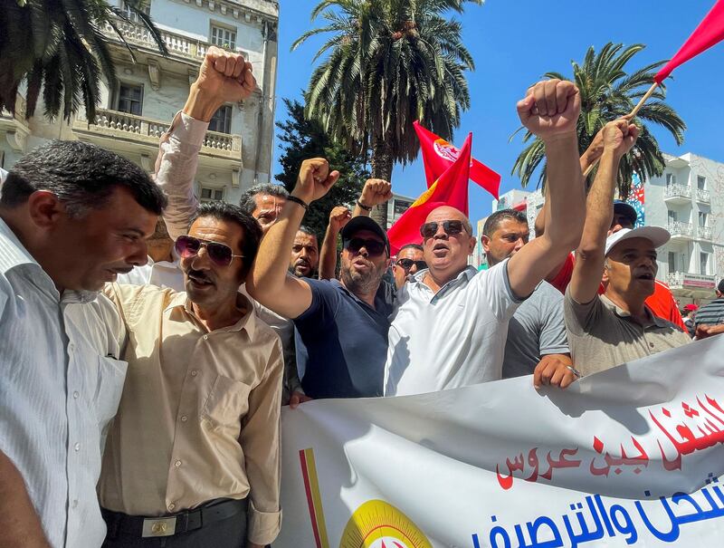 Tunisian General Labour Union supporters outside their Tunis headquarters during a national public strike on June 16. After several months of technical discussions with authorities, the IMF is ready to start programme negotiations in the coming weeks. Reuters