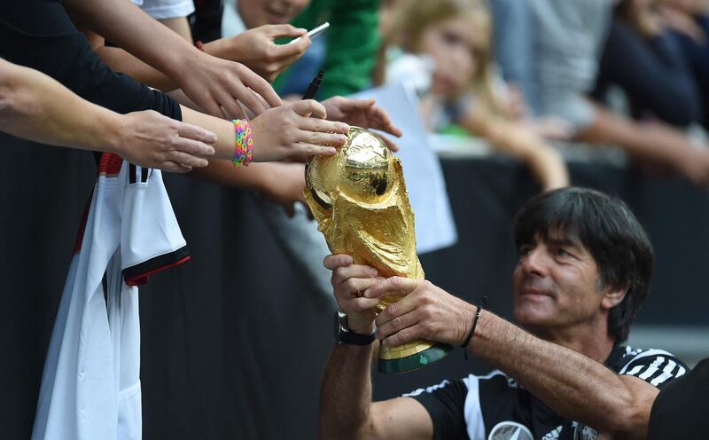 Joachim Low with the World Cup in 2014. AFP