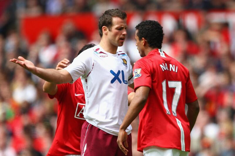 MANCHESTER, UNITED KINGDOM - MAY 03:  Lucas Neill of West Ham United squares up to Nani of Manchester United during the Barclays Premier League match between Manchester United and West Ham United at Old Trafford on May 3, 2008 in Manchester, England.  (Photo by Clive Mason/Getty Images)