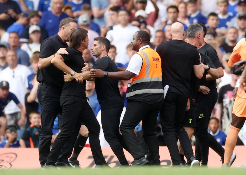 Tottenham manager Antonio Conte is restrained by security after clashing with Chelsea manager Thomas Tuchel after the match. Action Images