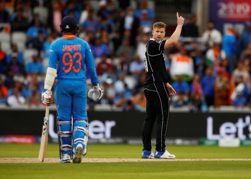 New Zealand's James Neesham celebrates the wicket of India's Yuzvendra Chahal. Reuters
