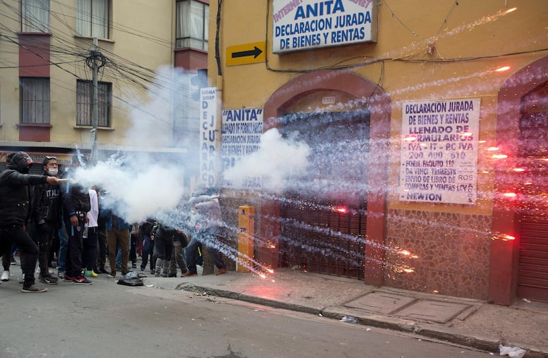 Student protesters launch fireworks at police during clashes in La Paz, Bolivia. Juan Karita / AP Photo
