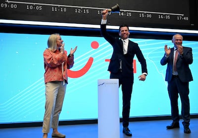 Mathias Kiep of the German travel group TUI rings the bell to start his company's trading at the Deutsche Boerse Stock Exchange in Frankfurt. AFP