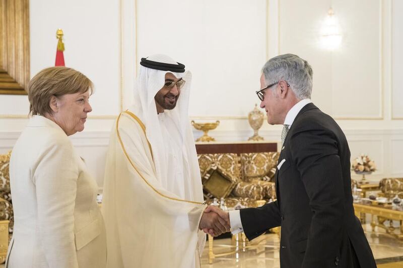 Ms Merkel was greeted at Abu Dhabi airport by Sheikh Mohammed, Crown Prince of Abu Dhabi and Deputy Supreme Commander of the Armed Forces, followed by an official reception with a 21-gun salute, according to the WAM news agency. Ryan Carter / Crown Prince Court — Abu Dhabi