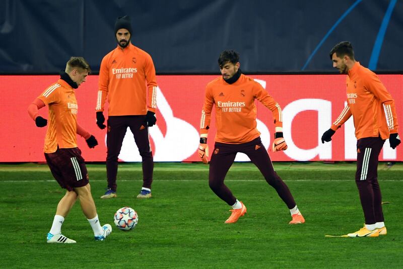 Real Madrid's midfielder Toni Kroos and teammates take part in a training session ahead of the Champions League match against Shakhtar Donetsk. AFP