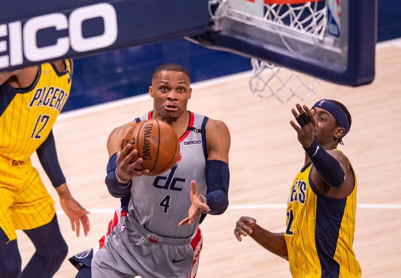 May 8, 2021; Indianapolis, Indiana, USA; Washington Wizards guard Russell Westbrook (4) drives to the basket during the second half of an NBA basketball game against the Indiana Pacers at Bankers Life Fieldhouse. Mandatory Credit: Doug McSchooler-USA TODAY Sports