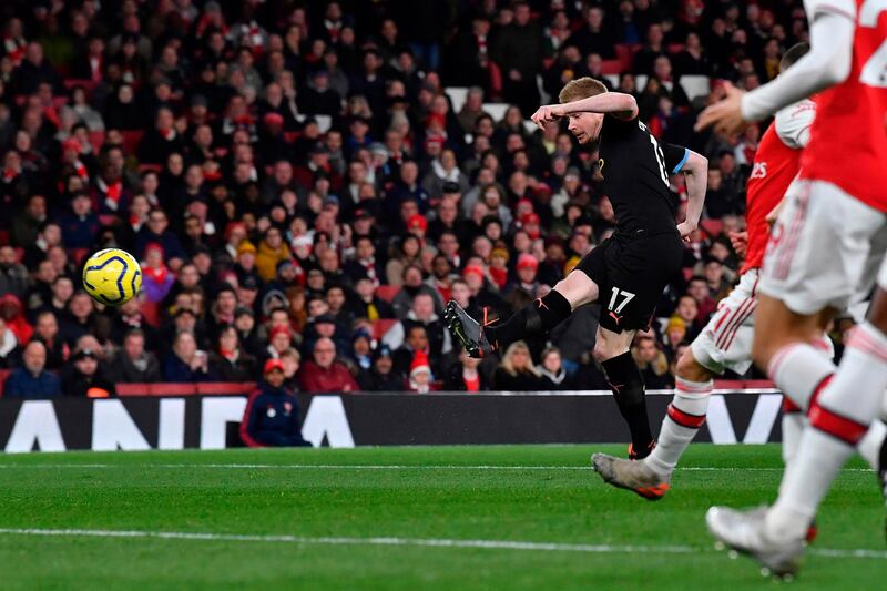 Manchester City's Kevin De Bruyne shoots to score the opening goal at the Emirates Stadium in London. AFP