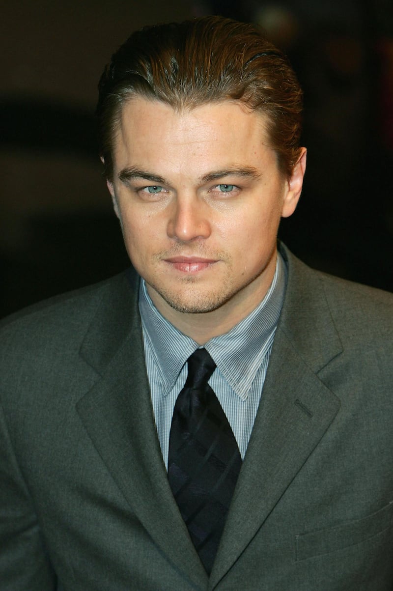 LONDON -  DECEMBER 19: Leonardo DiCaprio arrives at the UK Premiere of "The Aviator" at the Odeon West End on December 19, 2004 in London. (Photo by Gareth Cattermole/Getty Images)