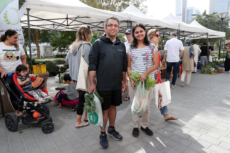 DUBAI , UNITED ARAB EMIRATES , January 18 ��� 2019 :- Rajat Khanna with his wife Priya Khanna at the Farmers Market held at the Bay Avenue in Business Bay in Dubai. (Pawan Singh / The National ) For News/Online/Instagram. Story by Patrick