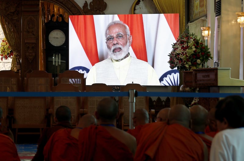 epa06125657 India Prime Minister Narendra Modi delivers message during the Interfaith Dialogue for Peace, Harmony and Security conference at the Sitagu International Buddhist Acedamy (SIBA) in Yangon, Myanmar, 05 August 2017. Religious leaders and delegates from 32 countries, altogether 255 people gathered for the two-day conference in Myanmar.  EPA/NYEIN CHAN NAING