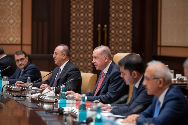Mr Erdogan with the Turkish delegation at the Presidential Complex. Mohamed Al Hammadi / Ministry of Presidential Affairs