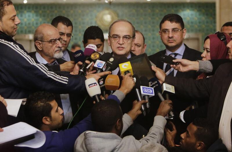 Hadi Al Bahra, head of the western-backed Syrian National Coalition, speaks during a press conference following his meeting with the Arab League’s secretary general, Nabil Elaraby, at the league’s headquarters in Cairo on December 27, 2014. Amr Nabil / AP Photo