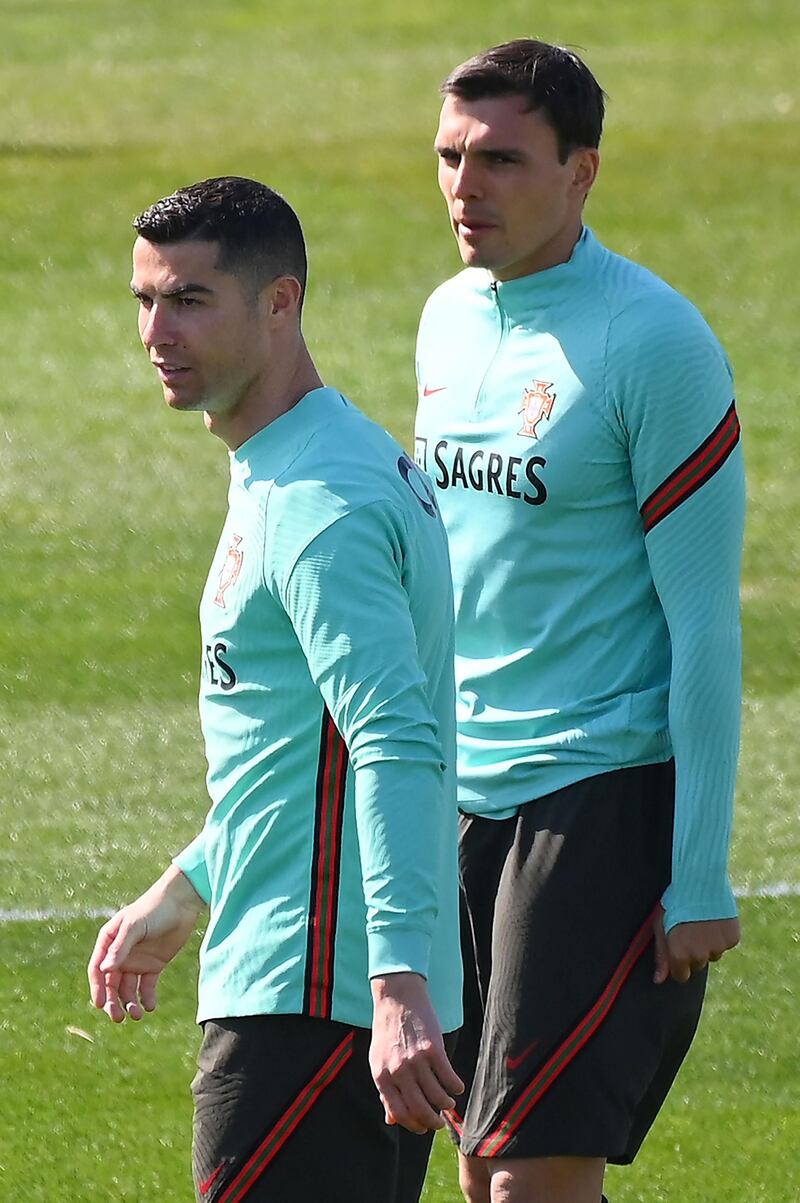 Cristiano Ronaldo looks on during training. AFP