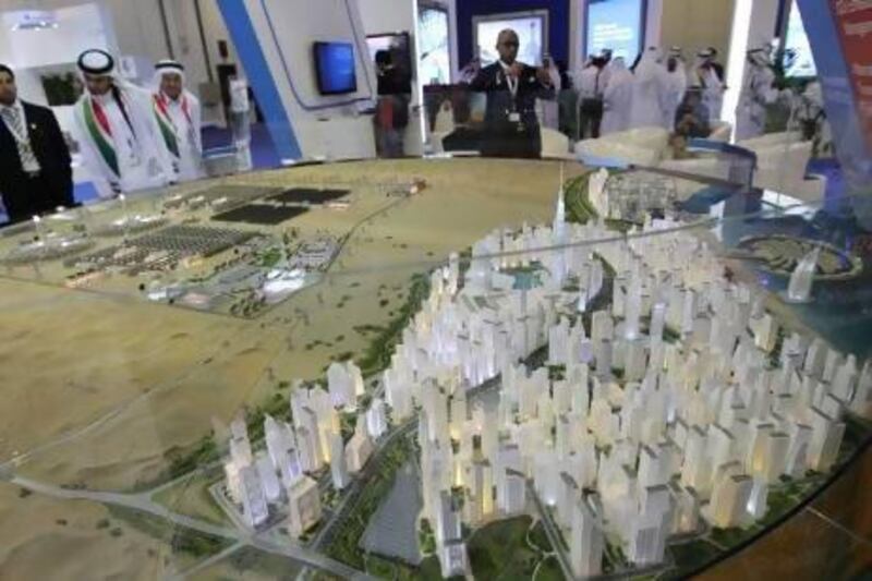 A display at this year's World Energy Forum exhibition, which was held in Dubai in October, showcasing the emirate's ambitious plans for the Sheikh Mohammed Bin Rashid Al Maktoum Solar Park. Ali Haider / EPA