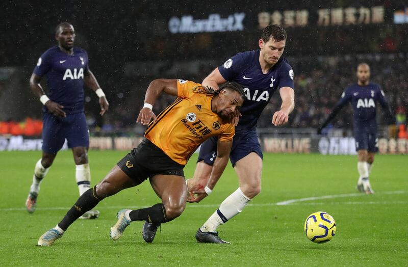 Soccer Football - Premier League - Wolverhampton Wanderers v Tottenham Hotspur - Molineux Stadium, Wolverhampton, Britain - December 15, 2019  Wolverhampton Wanderers' Adama Traore in action with Tottenham Hotspur's Jan Vertonghen          Action Images via Reuters/Carl Recine  EDITORIAL USE ONLY. No use with unauthorized audio, video, data, fixture lists, club/league logos or "live" services. Online in-match use limited to 75 images, no video emulation. No use in betting, games or single club/league/player publications.  Please contact your account representative for further details.