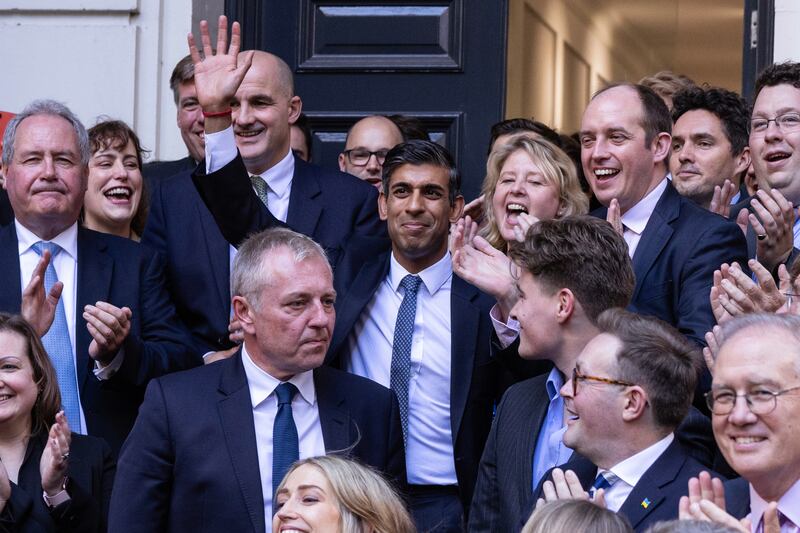 New Conservative Party leader and incoming Prime Minister Mr Sunak is greeted by colleagues at party headquarters in London in October 2022
