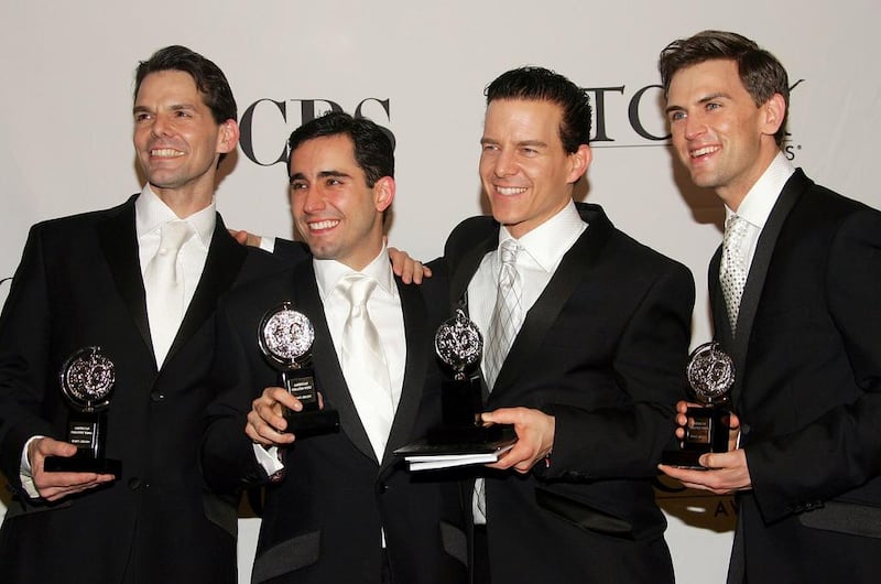 Members of the group Jersey Boys: actors J Robert Spencer, John Lloyd Young, Christian Hoff and Daniel Reichard pose backstage with their award for Best Musical at the 60th Annual Tony Awards at Radio City Music Hall on June 11, 2006 in New York City. Young and Hoff also won individual best acting awards for the show. Lloyd is also in the film version. Evan Agostini / Getty Images