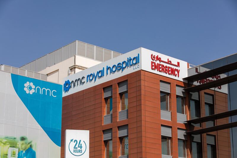An emergency department sign sits on display outside the NMC Royal Hospital, operated by NMC Health Plc, in Abu Dhabi, United Arab Emirates, on Sunday, March 1, 2020. Troubled NMC Health Plc, the largest private health-care provider in the United Arab Emirates, asked lenders for an informal standstill on its debt as Abu Dhabi weighs an injection of capital to safeguard the emirate’s reputation among global investors. Photographer: Christopher Pike/Bloomberg
