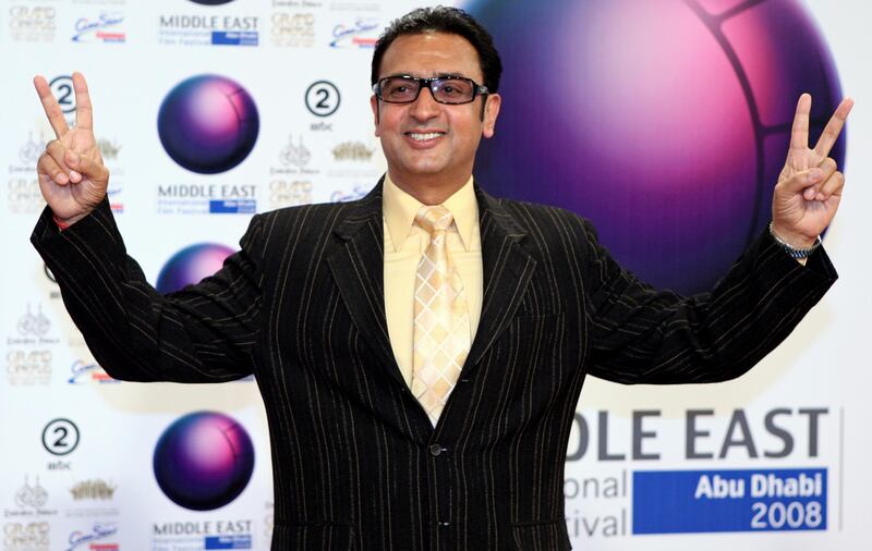 Abu Dhabi - October 16, 2008 - Bollywood actor Gulshan Grover gestures to photographers on the red carpet before the screening of the film, Karzzzz, during the Middle Eastern International Film Festival at Emirates Palace in Abu Dhabi, October 16, 2008. ( Jeff Topping / The National) *** Local Caption ***  JT009-1016-BOLLYWOOD KARZZZZ IMG_9280.jpgJT009-1016-BOLLYWOOD KARZZZZ IMG_9280.jpg