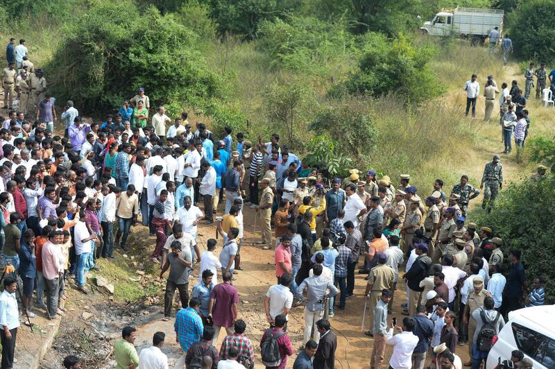 Police block an area near the site where they shot dead four detained gang-rape and murder suspects in Shadnagar. AFP