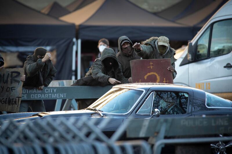 Actors and extras appeared to be taking part in a protest scene. Getty Images