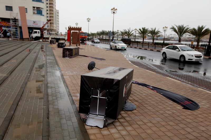 Sharjah, April 7, 2013 - Signs lay overturned in the Heart of Sharjah after yesterday's storm, April 7, 2013. (Photo by: Sarah Dea/The National)