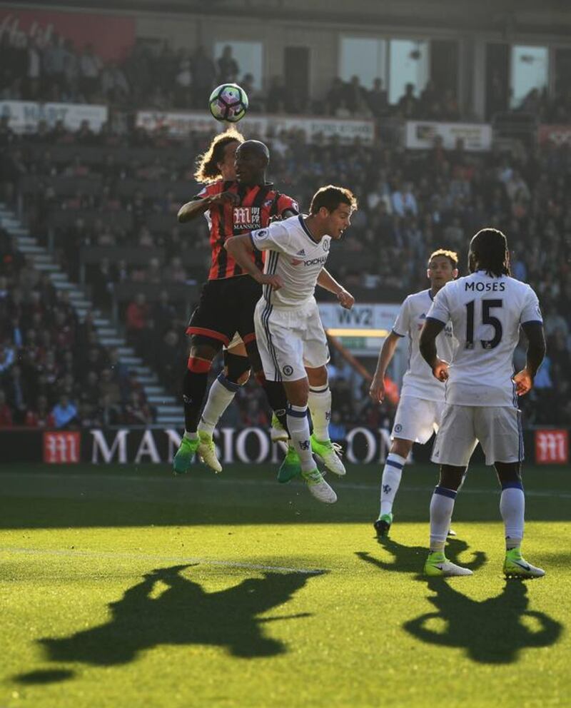 Benik Afobe of Bournemouth wins a header. Mike Hewitt / Getty Images