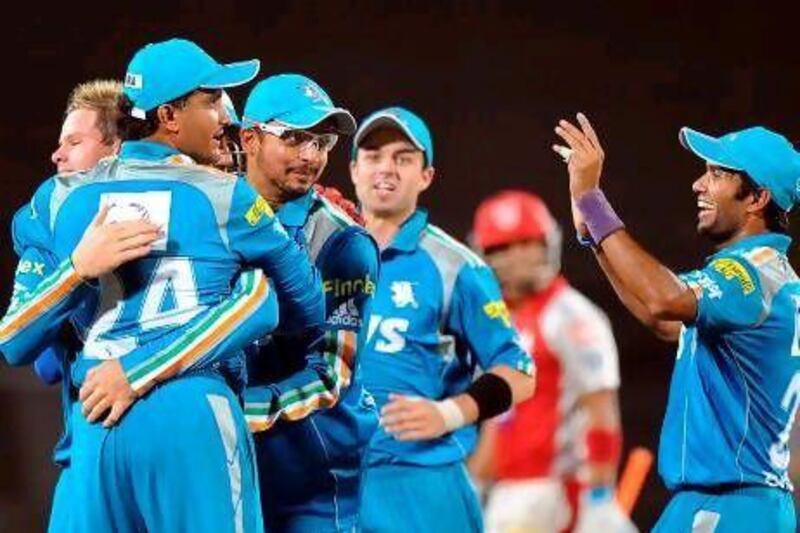 Pune Warriors celebrate beating Punjab.