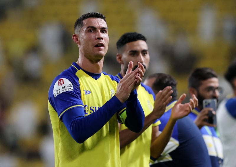 Al Nassr's Cristiano Ronaldo applauds fans after the match. Reuters