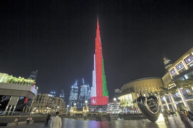 Dubai, United Arab Emirates- Burj Khalifa with the Omani flag for the Omani national day. Leslie Pableo for The National