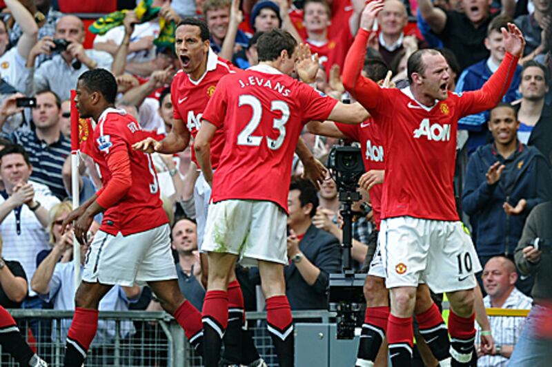 Manchester United players celebrate their winning goal against Everton on Saturday. The side have won a number of games with goals in the last 10 minutes this season.