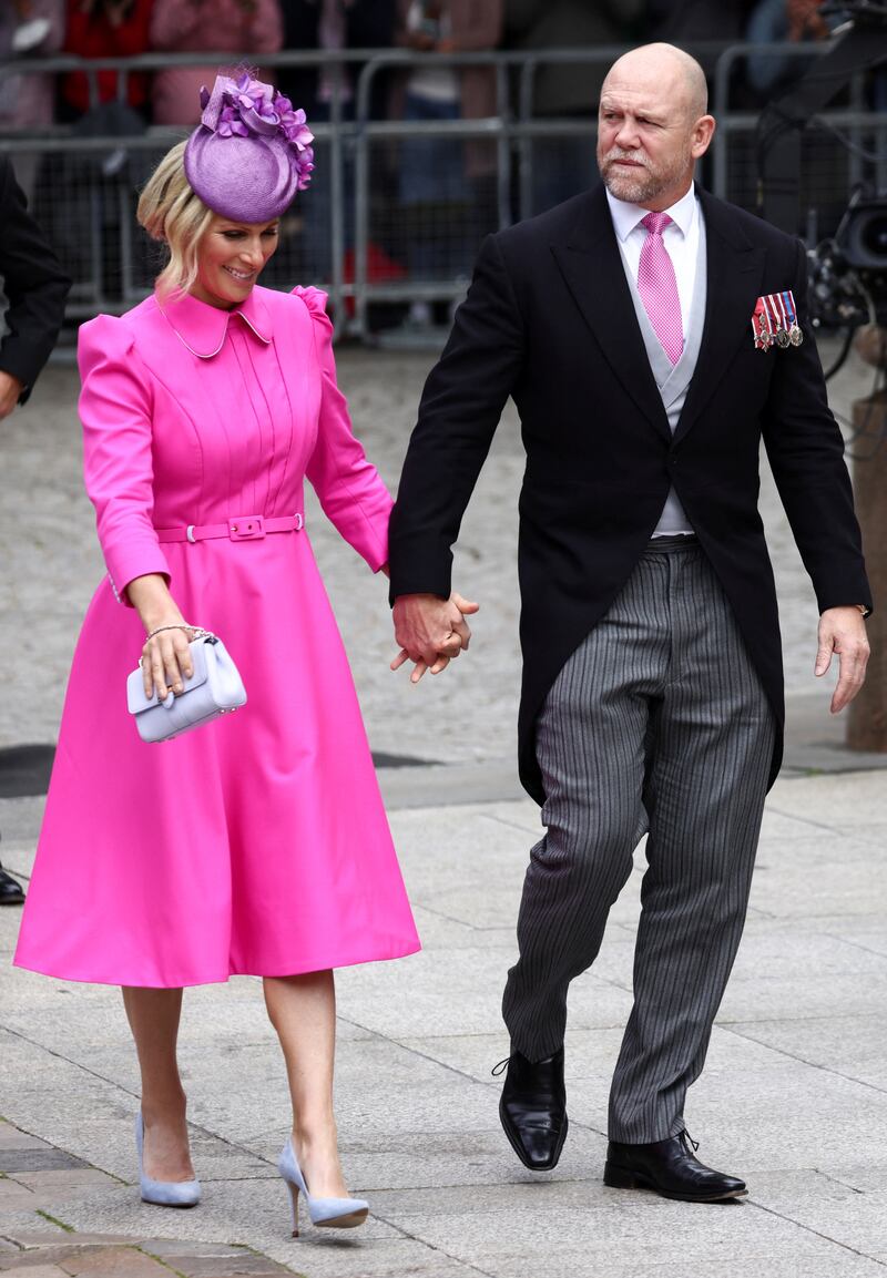 Zara and Mike Tindall arrive for the national service of thanksgiving. PA 