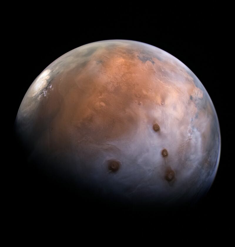 The high-resolution camera, called the eXploration imager instrument, aboard the Hope probe is  allowing space enthusiasts to create stunning images of the planet. They are processing the raw monochromatic images to highlight Mars' geographical features. This image was enhanced by Andrea Luck and shows a cloudy day on the planet. The North Pole, Olympus Mons (largest planet in the solar system) and Tharsis Montes (a region home to three large shield volcanoes) is also visible. Photo: Hope Mars Mission / Andrea Luck