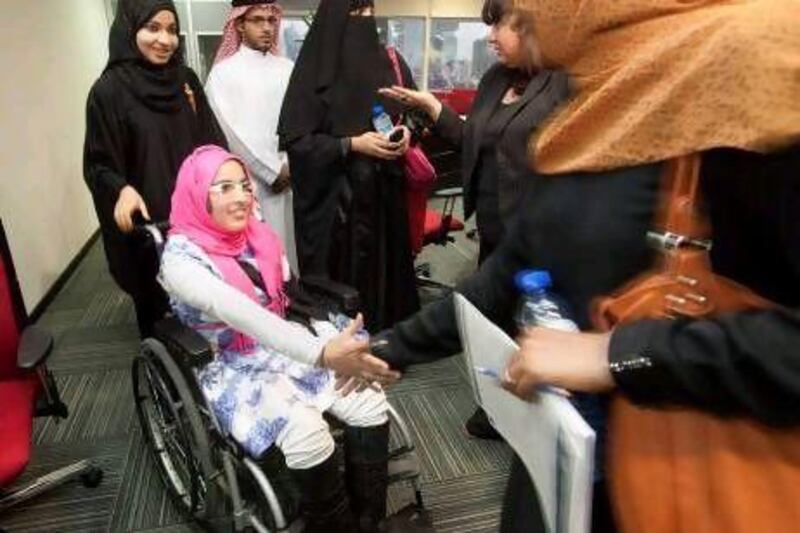 Fatima Mohammed, 16, (in a wheelchair) attends a forum on education for special needs children at Dubai School of Government.