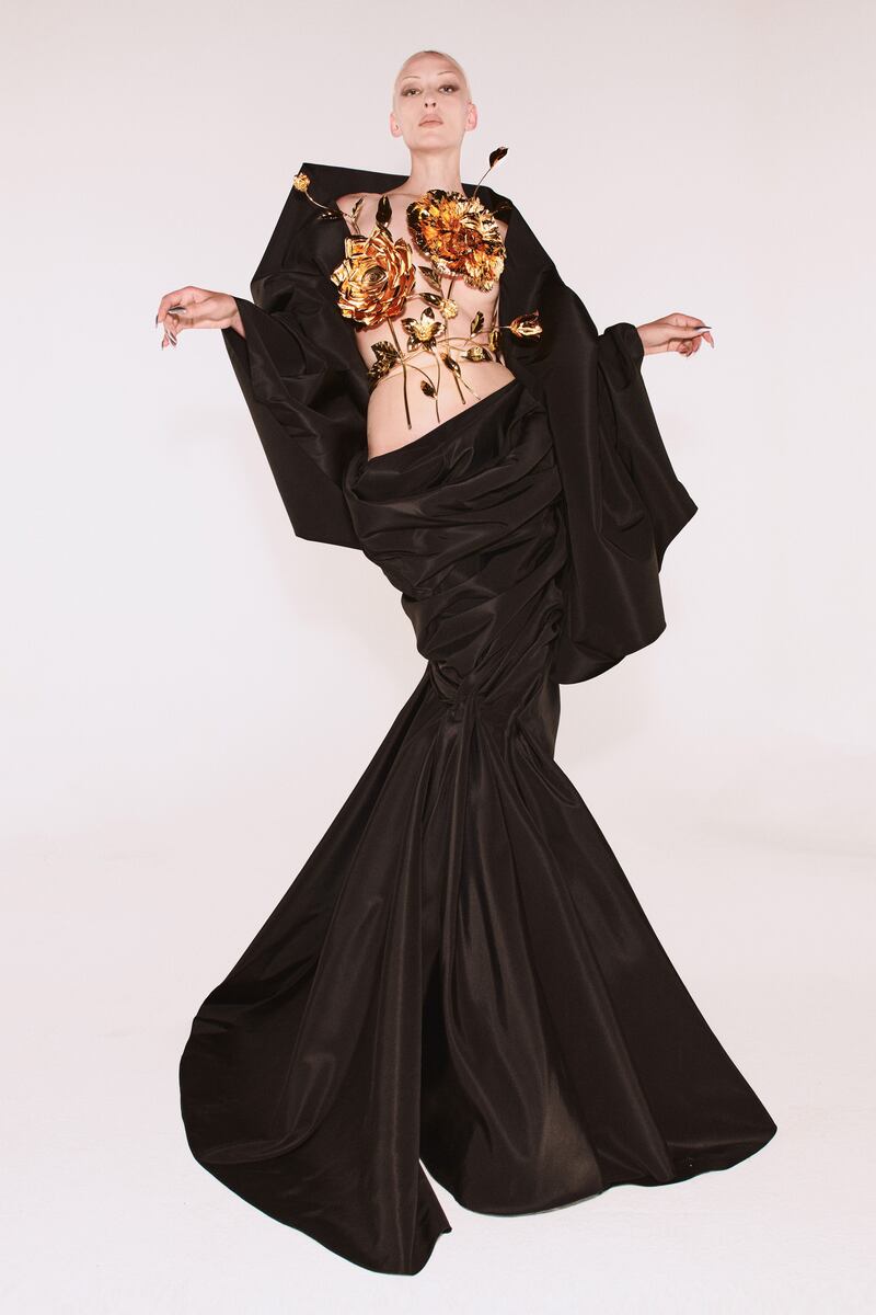 Schiaparelli autumn haute couture 2021 by Daniel Roseberry has a front made of metallic flowers. Photo: Schiaparelli