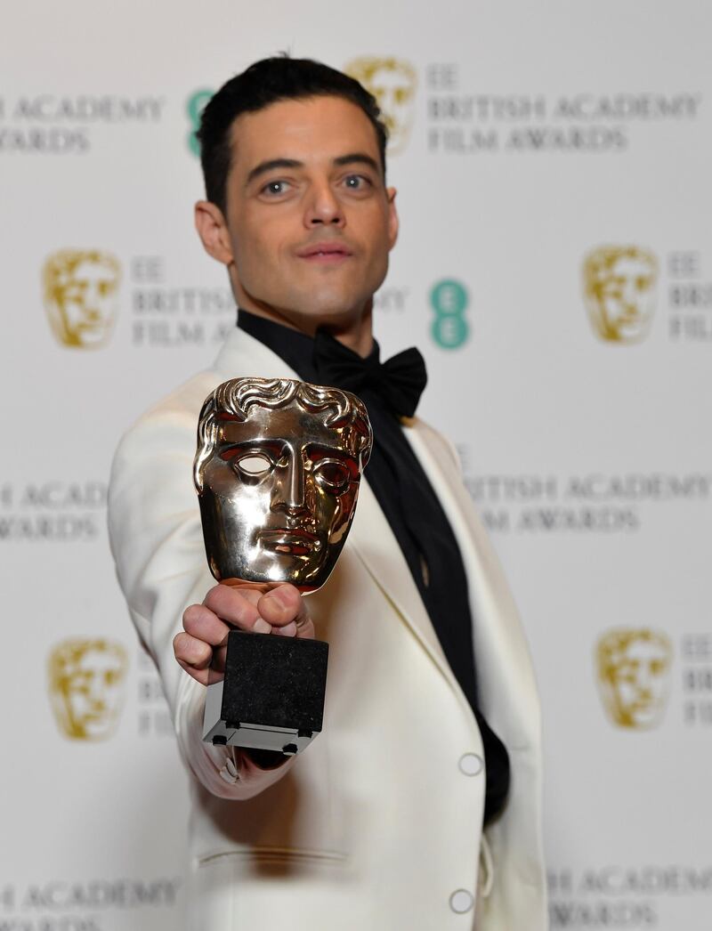 Rami Malek holds the award for leading actor for his performance in 'Bohemian Rhapsody' at the British Academy of Film and Television Awards 2019. Reuters