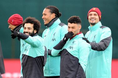 Dejan Lovren (right) with Mohamed Salah, Alex Oxlade-Chamberlain and Virgil Van Dijk at the Liverpool training ground in February before the lockdown started. Getty